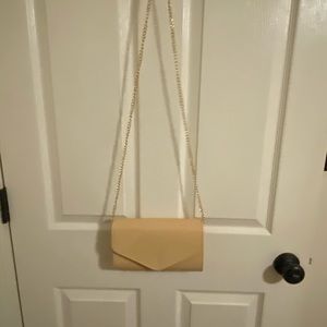 Beige clutch with gold strap   Used once